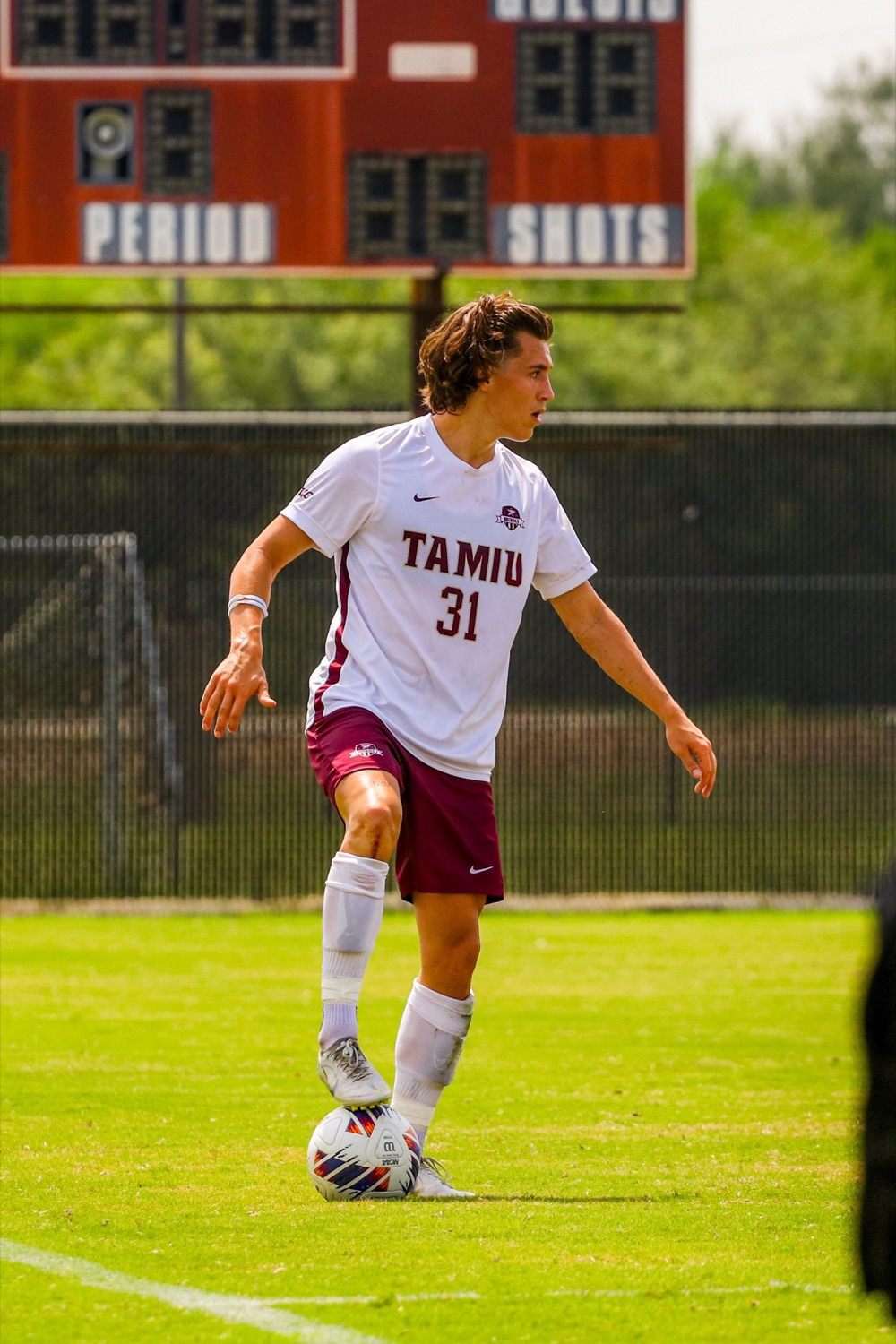 Nico competing in an NCAA soccer match after rehabilitation